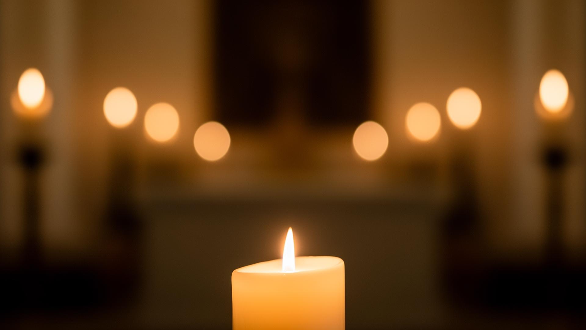 A candlelit setting for quiet remembrance
